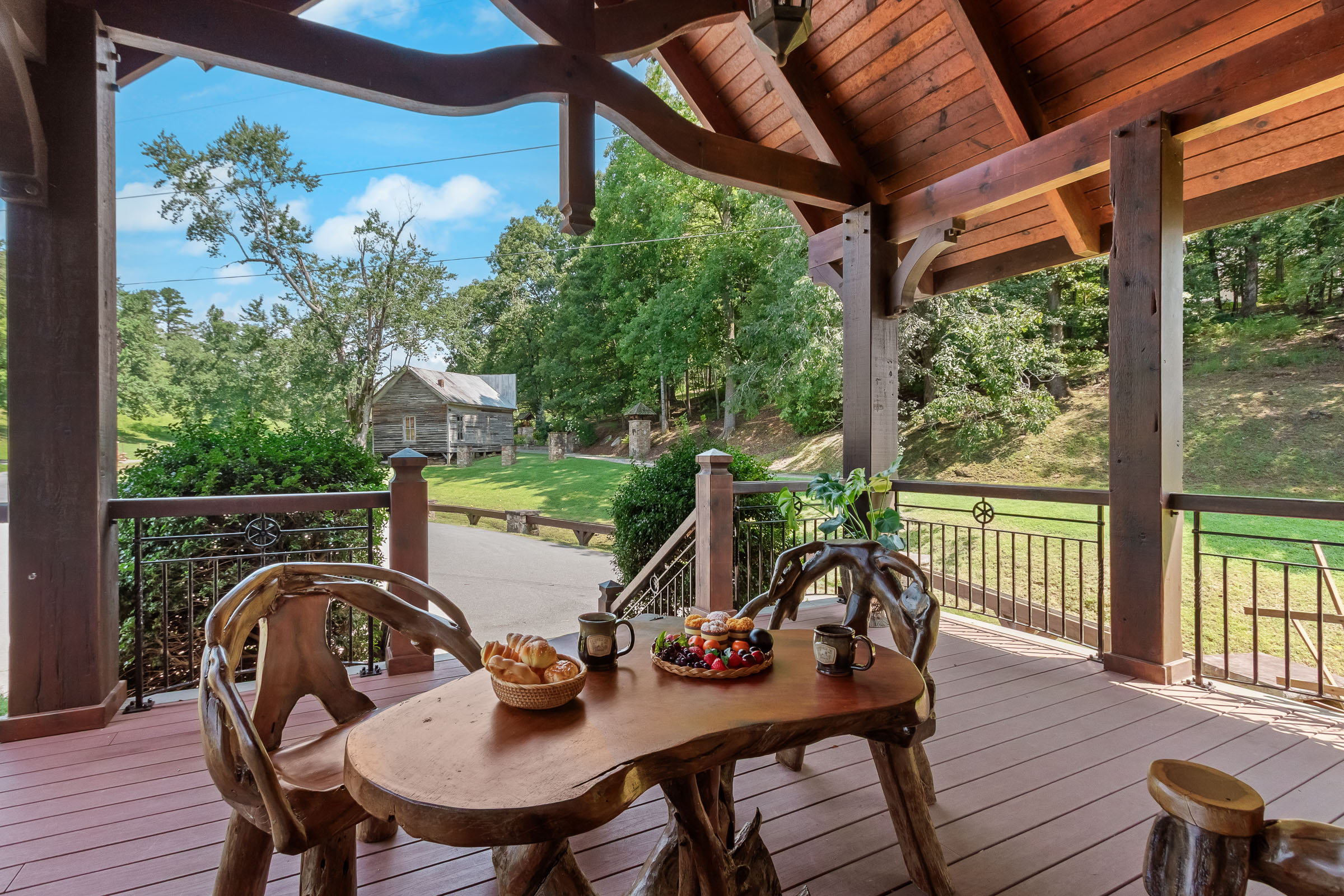View from The Millhouse Lodge porch toward the farm grounds and historic building
